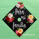 Graduation Cap Topper Para Mi Familia with glitter and flowers